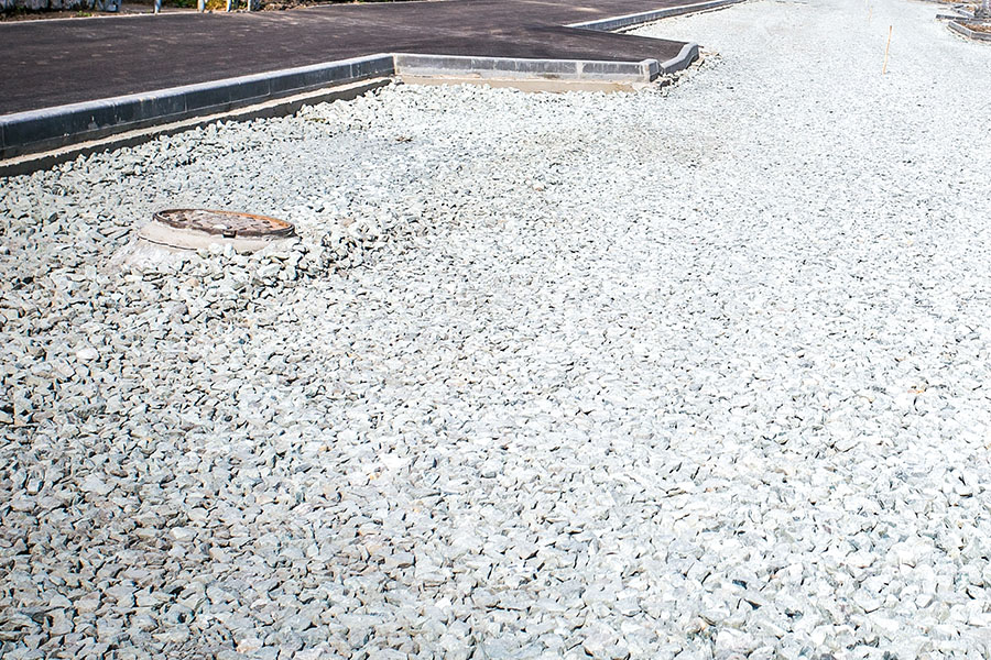 how to stop erosion on a gravel driveway