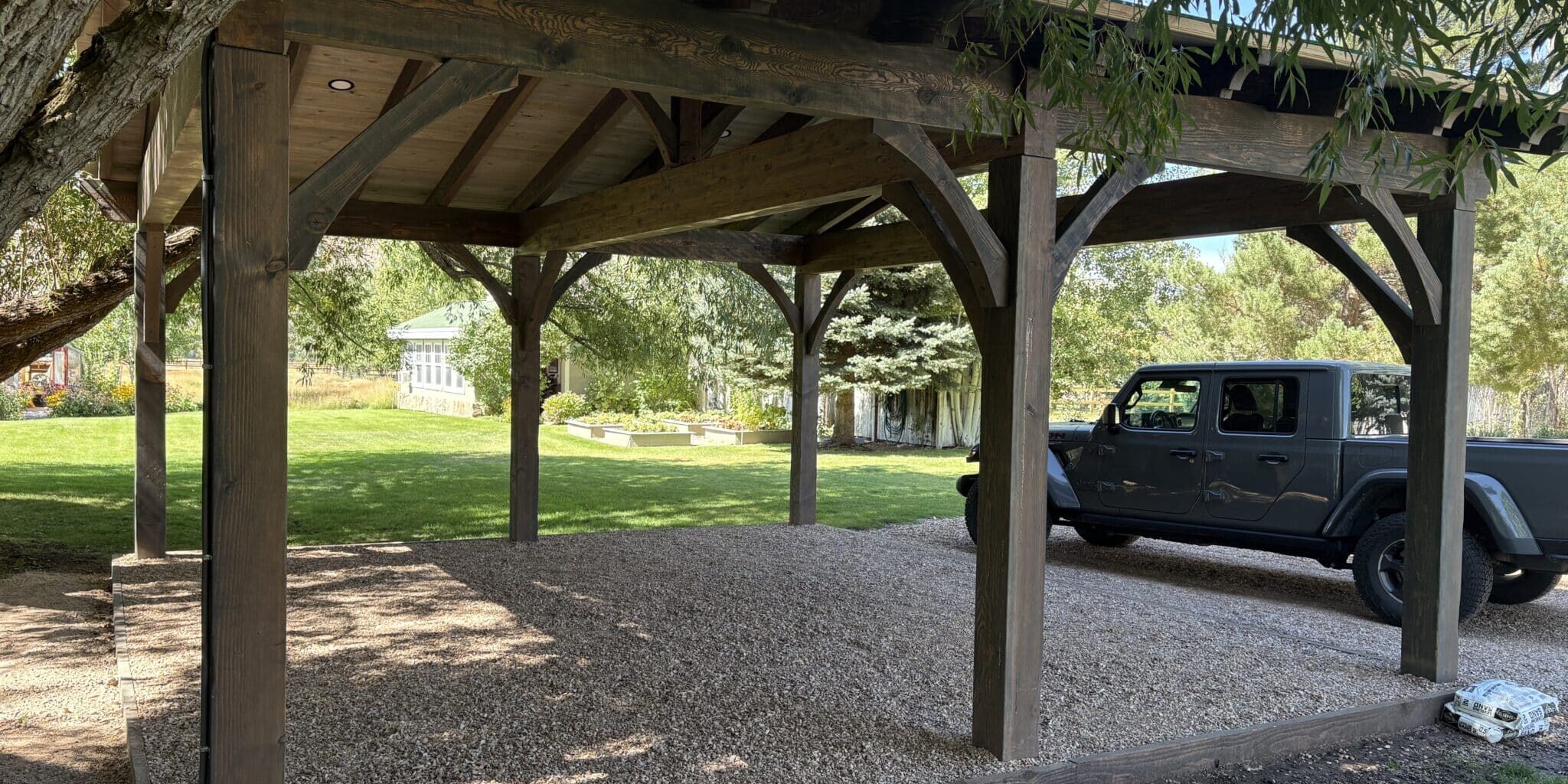 Wooden structure with gravel and truck