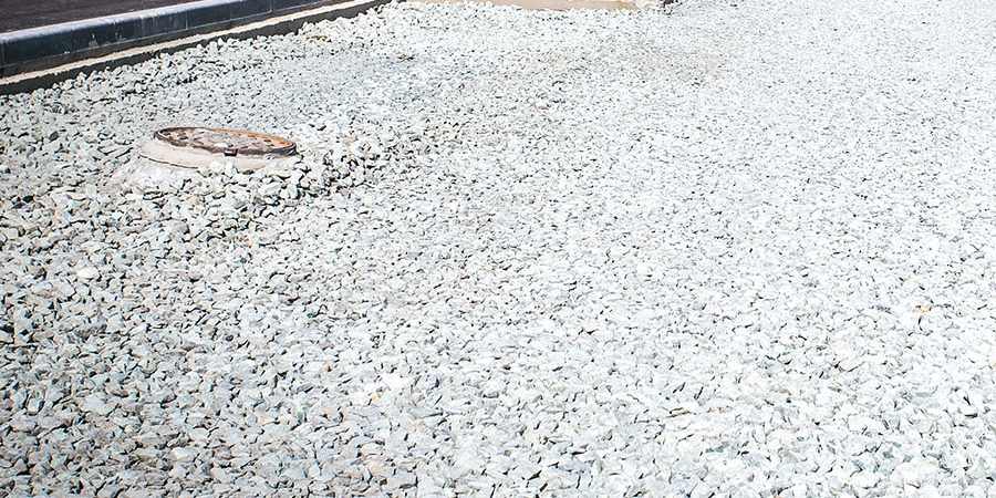 how to stop erosion on a gravel driveway
